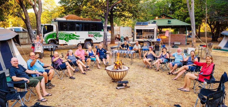 8 Adventure Wild Kimberley Tours group settle in for an evening around the campfire at Ivanhoe Village Caravan Park, Kununurra - Day 8
