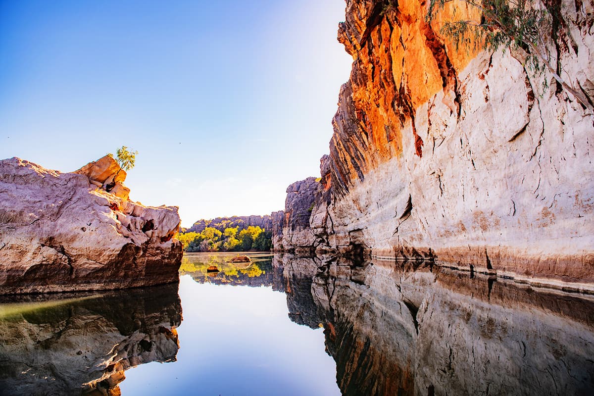 Early morning light on the Fitzroy River as it carves its way through the 30 m cliffs of the Danggu Geike and Oscar Ranges.