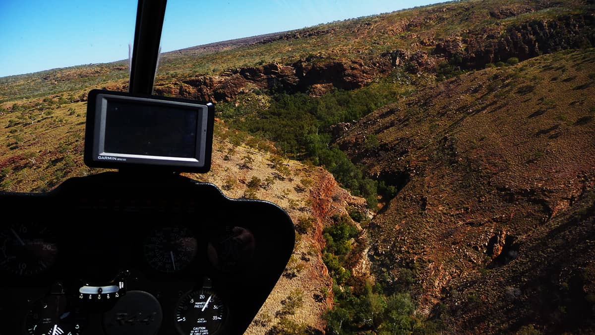 Helicopter flight over a gorge on Mable Downs Station near Purnululu National Park, the Bungle Bungles.