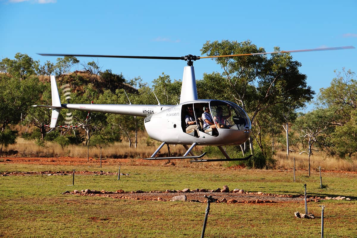 Watch the earth drop away as the helicopter takes off. Used for tourism, transport & mustering in the Kimberley