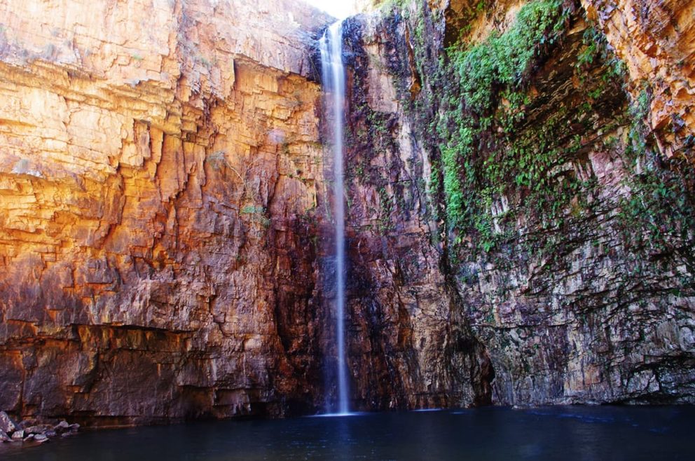 Water falls from sheer cliffs 65m high into a refreshing pool. Thermal waters trickle from rocks to the right of Emma Gorge