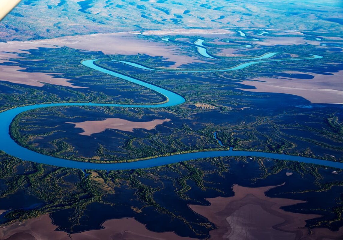 The Ord River meanders like the Aboriginal Dreamtime Rainbow Serpent through the Kimberley landscape around Kununurra