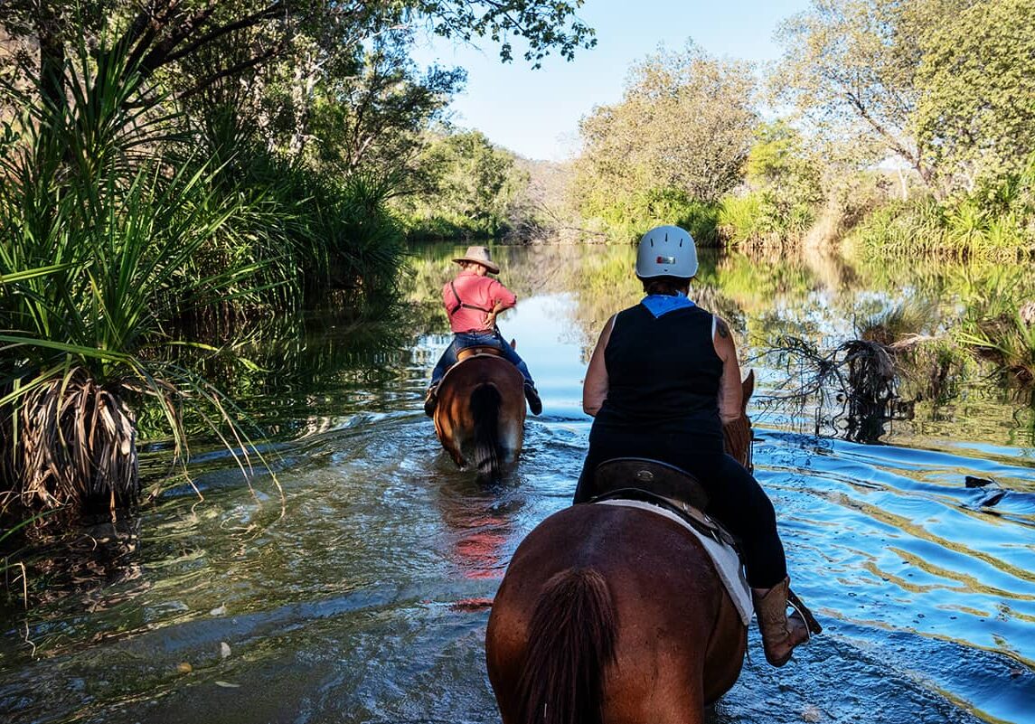 Wading through rivers on horseback at El Questro Station, Gibb River Road, the Kimberley is a unique experience